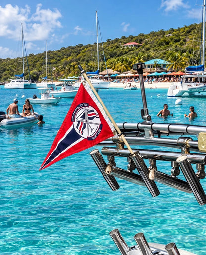 Cocktail Cove Yacht Club burgee flag flying from a boat at Soggy Dollar