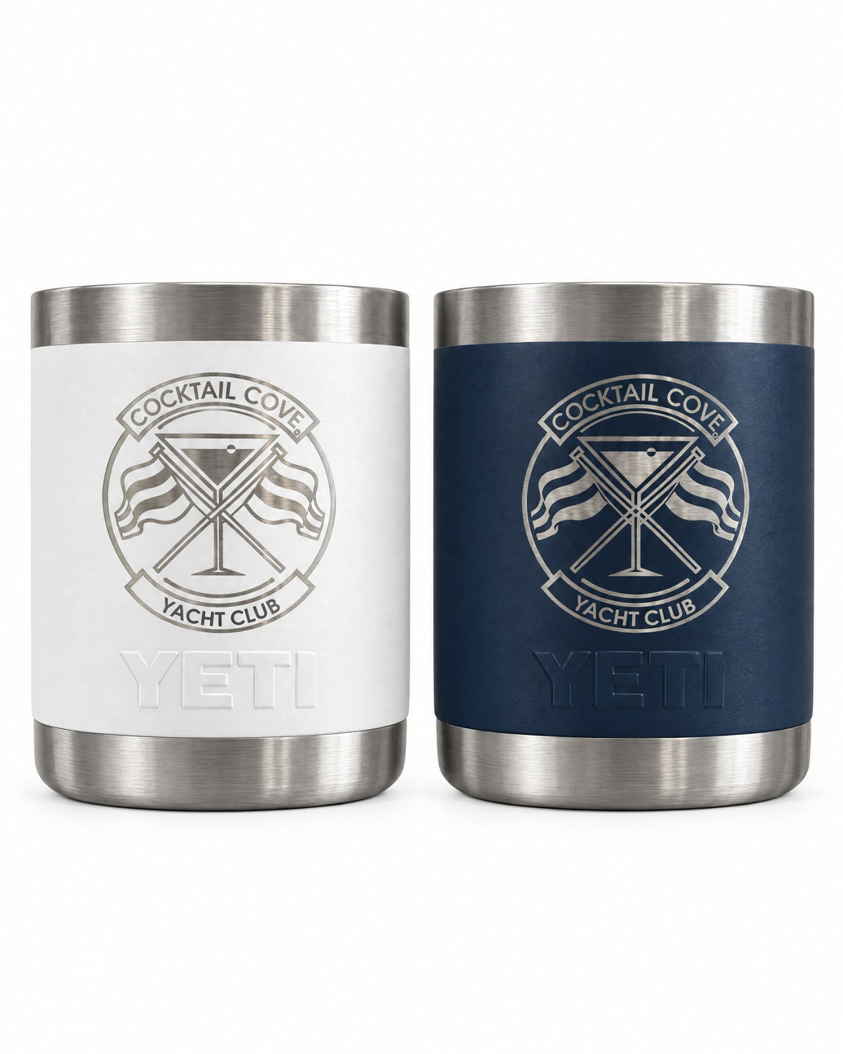 White and navy YETI Rambler 10oz Lowballs engraved with the Cocktail Cove Yacht Club crest