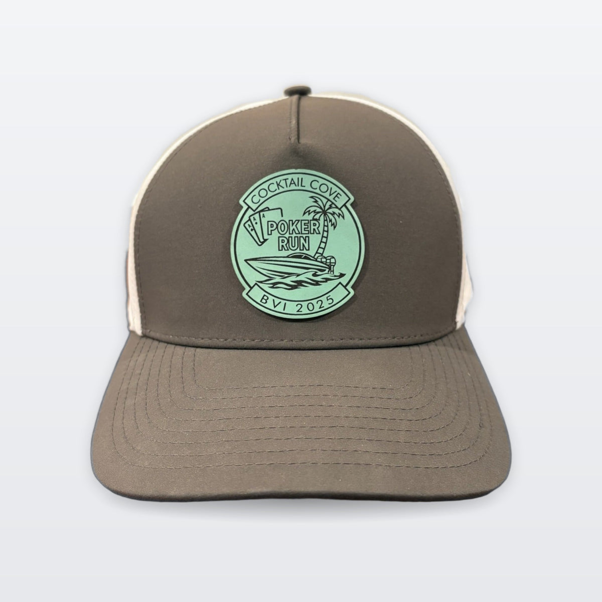 Custom hat example: charcoal and white trucker hat with a seafoam Cocktail Cove BVI Poker Run 2025 patch