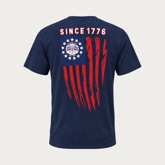 Since 1776 Tee in navy, back: distressed American flag with the Cocktail Cove Yacht Club crest in a ring of stars