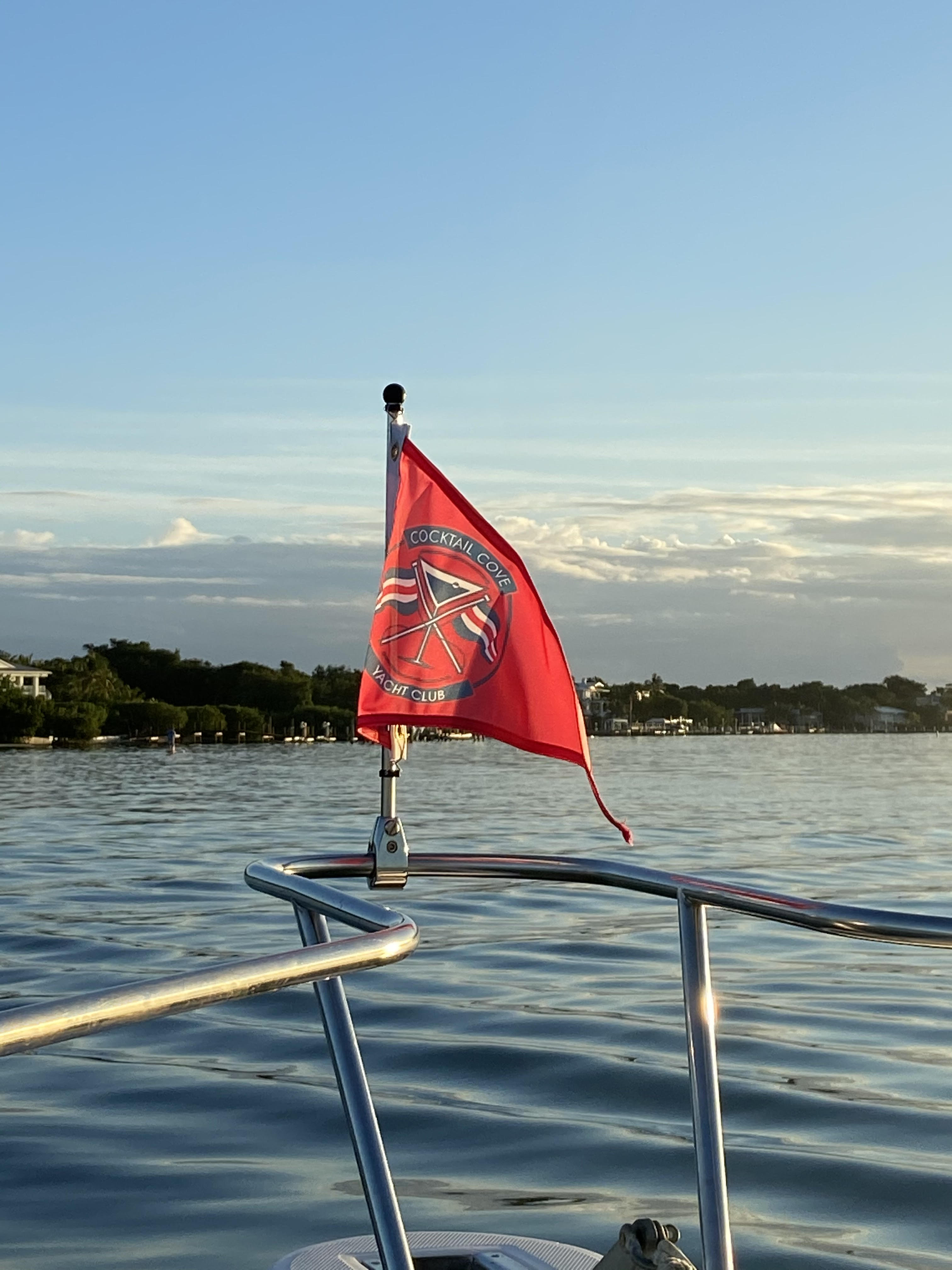 Cocktail Cove Yacht Club flag on the bow